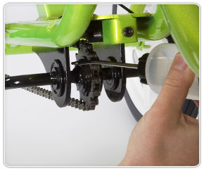 Place oil at location of Rifton trike special needs chain