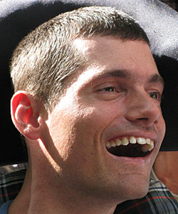 31 year old Duane smiles broadly at his birthday celebration