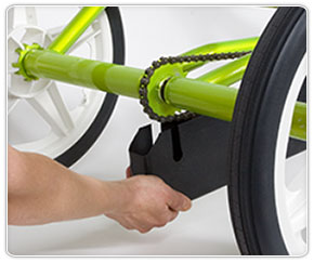 Removing the bottom cover from an adaptive special needs bike for kids