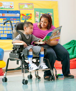 A child with low tone is positioned dynamically in the Rifton Activity chair