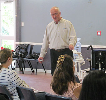 A room full of therapists with Rifton representatives hosting an educational day in New Zealand