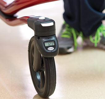 A close-up showing the caster and odometer features on the new Dynamic Pacer gait trainer