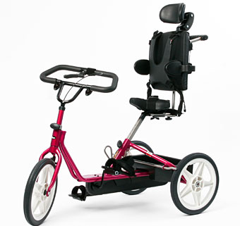 glamour shot of a pink adaptive tricycle for people with cerebral palsy