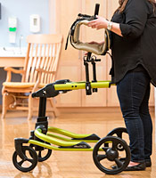 A school therapist shows you how to turn the chest prompt on the Pacer gait trainer. 