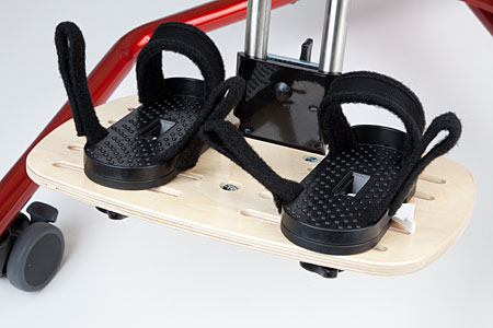 Using a hack on a special needs supported standing device an added footboard and sandals helps increase abduction range in the hips