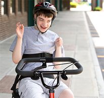 Teenage boy on a Rifton Adaptive Trike