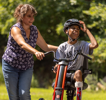 Teenage boy on a Rifton Adaptive Trike