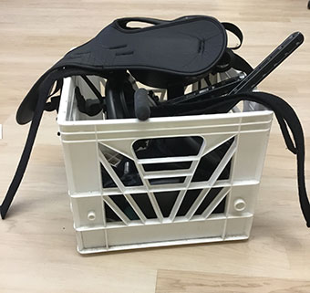 A picture of the crate used to organize adaptive equipment at the Langan School. 