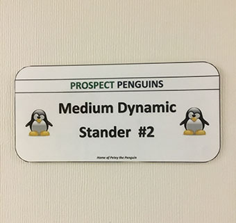 A close up of a license plate to organize the move equipment at Langan school.
