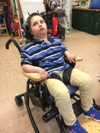 Yaacov after using the Rifton Activity Chair pelvic harness