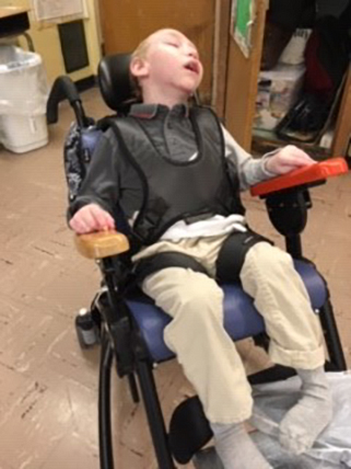 Nachum after using the Rifton Activity Chair pelvic harness