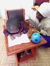 A supportive chair made by APT Kenya