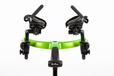 An example of the arm supports positioned for a forward leaning posture on a green Rifton Pacer gait trainer.
