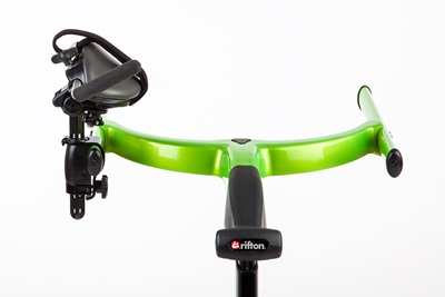 Arm support rotated in on a green Rifton Pacer gait trainer.