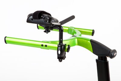 Arm prompt positioned far back on a green Rifton Pacer gait trainer.