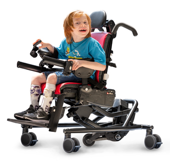 A boy sits on a Rifton Activity Chair and smiles.