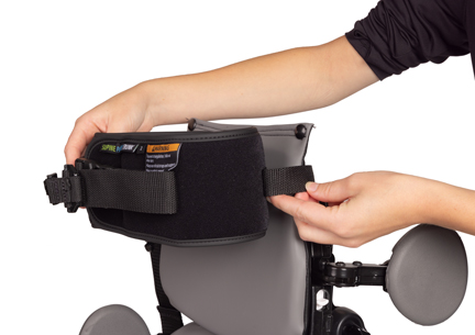 A pair of hands shown making adjustments on a Size 2 Rifton Stander