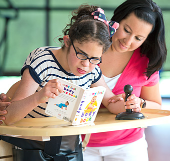 the Rifton Supine Stander tray in use
