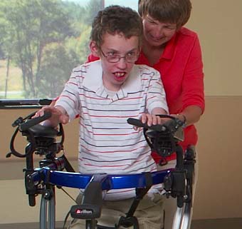 a client in a Rifton Dynamic Pacer