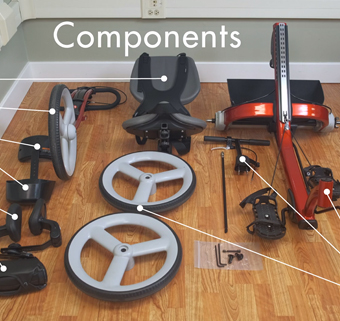 Components of a red Rifton Adaptive Tricycle